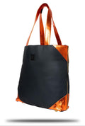 Black and Orange SL Tote (Poppy): Black and orange lambskin leather shoelugg inspired by my dad's (Harold Bonilla) love and dedication to the New York Knicks