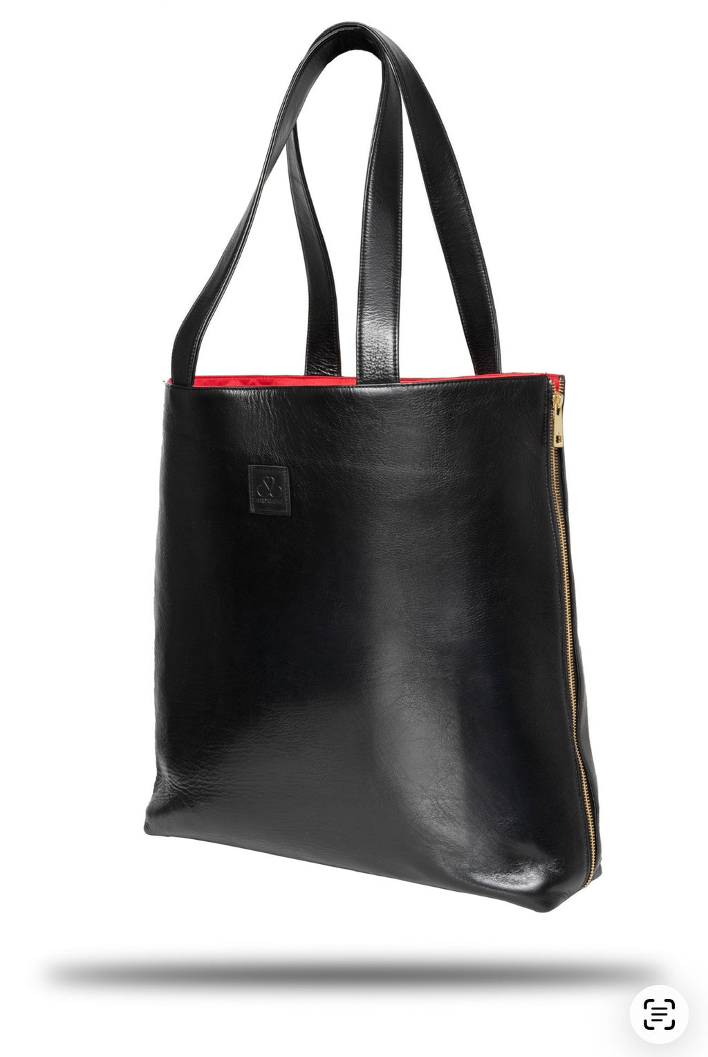Black Cowhide Leather SL Tote (Harlem): This rich cow hide leather is the epitome of the Harlem I grew up in. Bold, Black, Beautiful, Tough yet Chic