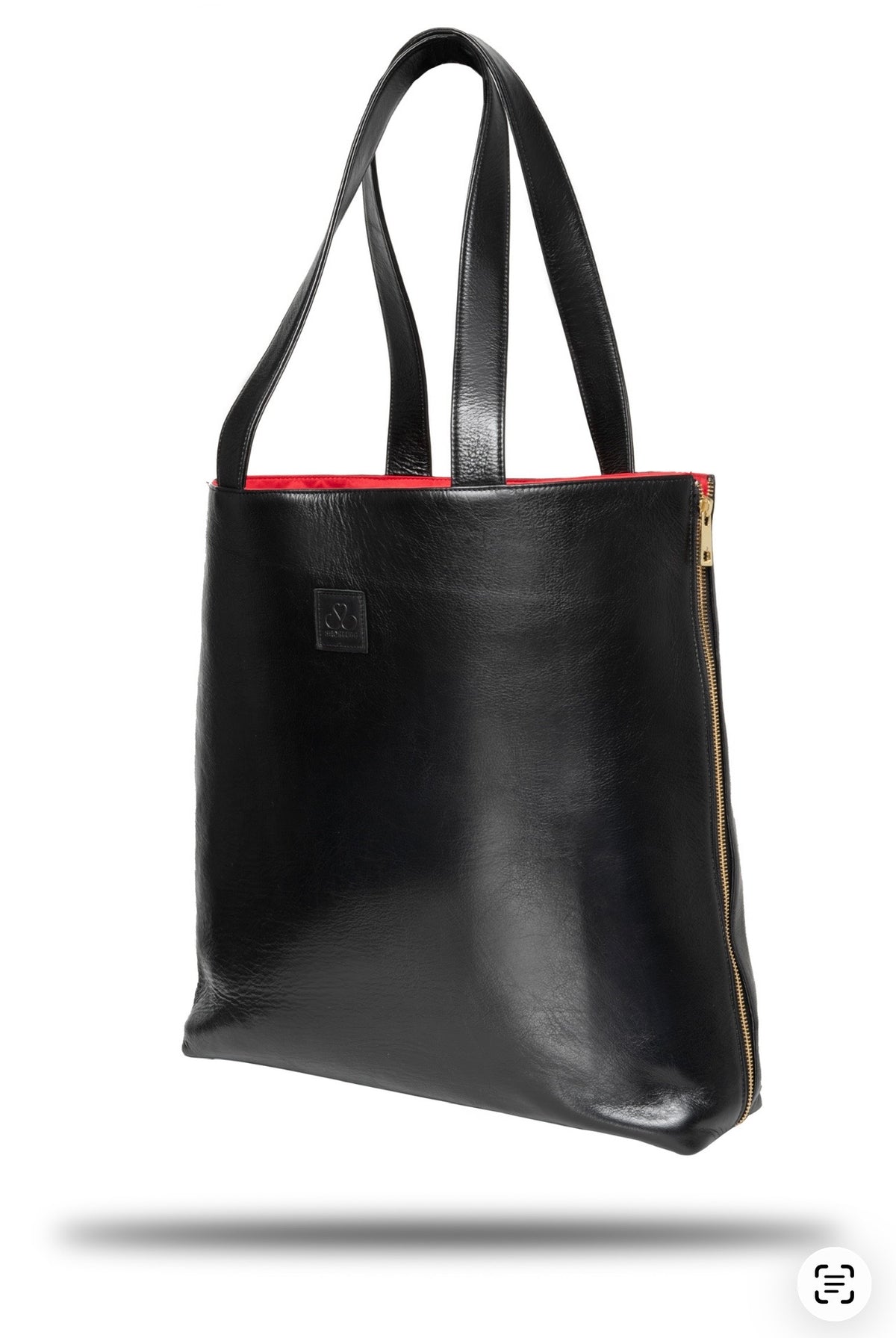 Black Cowhide Leather SL Tote (Harlem): This rich cow hide leather is the epitome of the Harlem I grew up in. Bold, Black, Beautiful, Tough yet Chic