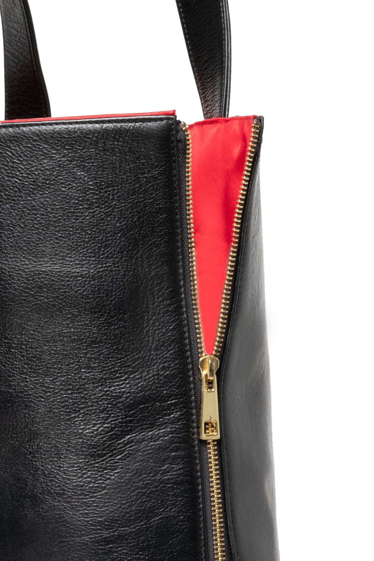Black Cowhide Leather SL Tote (Harlem): This rich cow hide leather is the epitome of the Harlem I grew up in. Bold, Black, Beautiful, Tough yet Chic