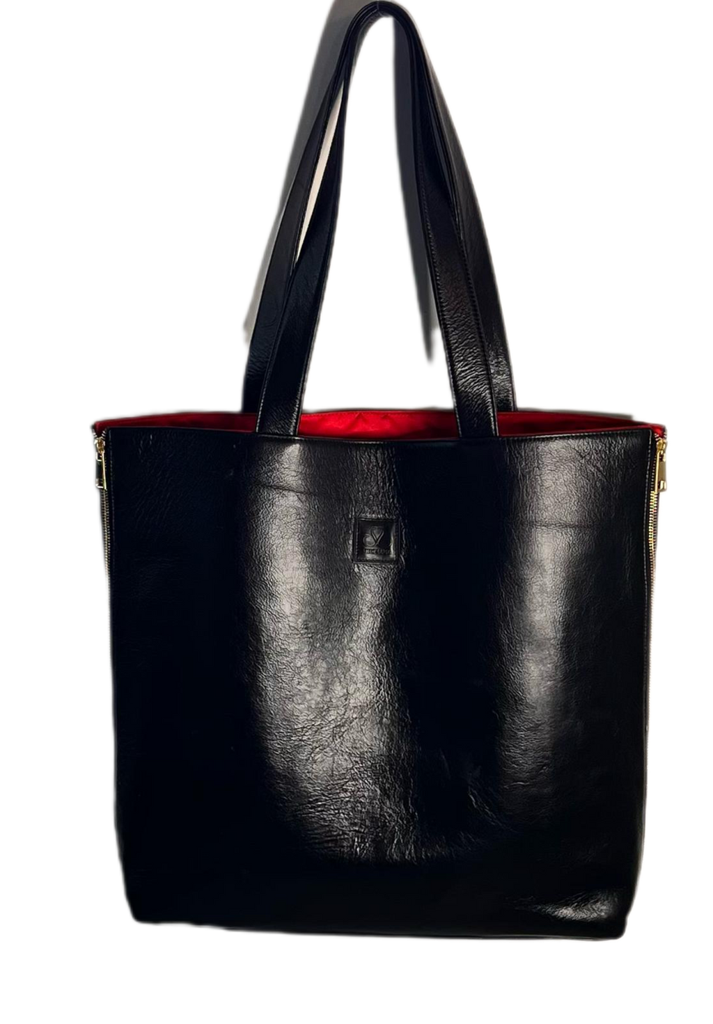 Black Cowhide Leather SL Tote (Harlem): This rich cow hide leather is the epitome of the Harlem I grew up in. Bold, Black, Beautiful, Tough yet Chic
